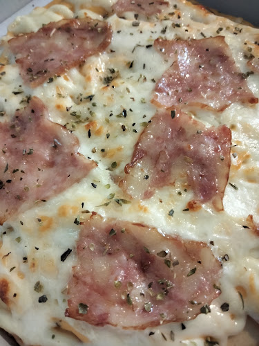 พิซซ่าเจ้าวายุ - การบริการอาหารและที่พัก