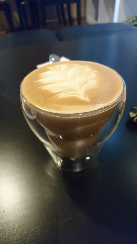 เบลล่าคอฟฟี่ - การบริการอาหารและที่พัก