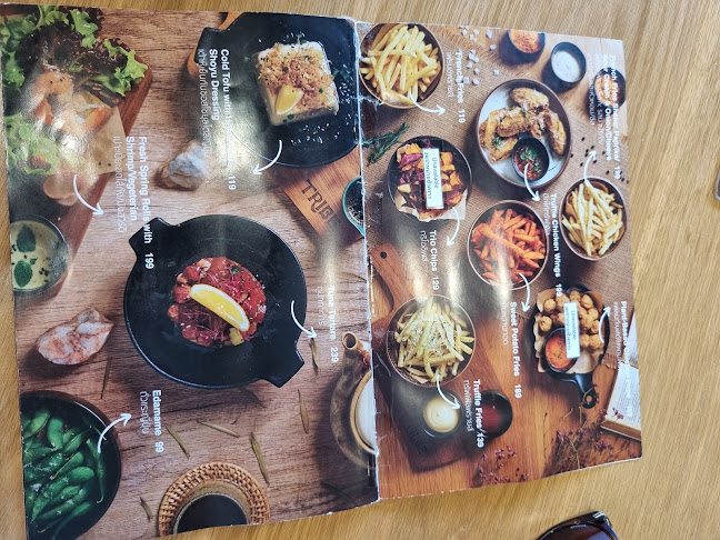 Tribe Cafe - การบริการอาหารและที่พัก