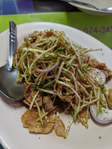 ร้านนัดพบยูงทอง 金孔雀餐厅 - การบริการอาหารและที่พัก