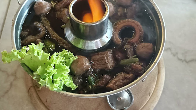 โอสถหม้อไฟ​ เนื้อตุ๋นรสเลิศ - เมือง