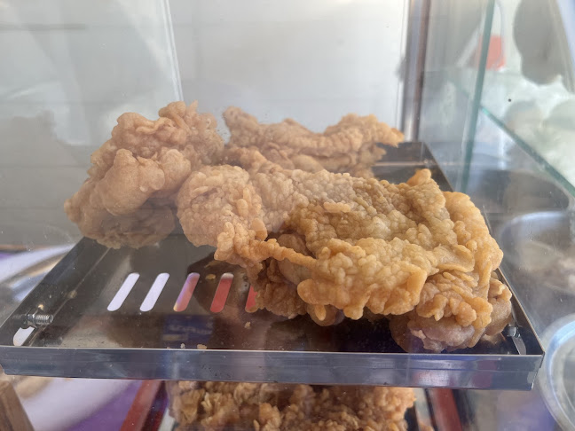 ตงเฉิน ข้าวมันไก่ - 冬晨 鸡油饭 (โพธิ์กลาง) - การบริการอาหารและที่พัก