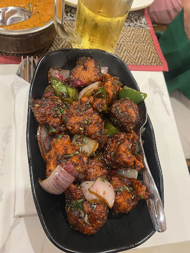 Magic Masala Indian Restaurant - การบริการอาหารและที่พัก