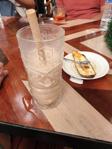 Three Monkeys Restaurant - การบริการอาหารและที่พัก